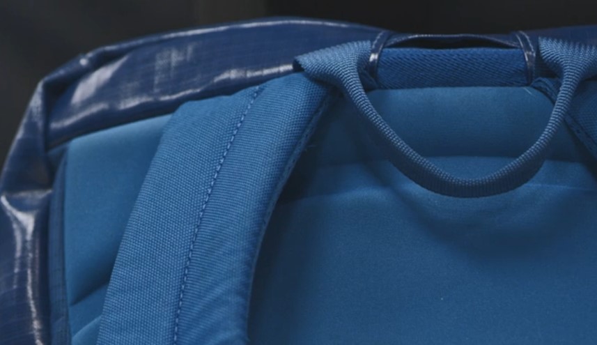 Blue school backpack, close up view