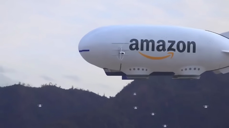 An Amazon airship with drones flying nearby over mountains